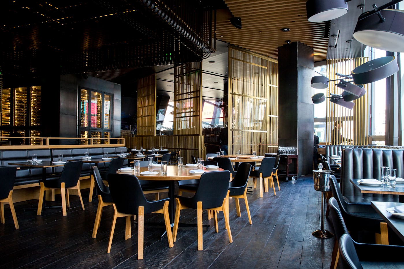 A busy dining room — reviews work when they sound like a table talking, not a marketing department
