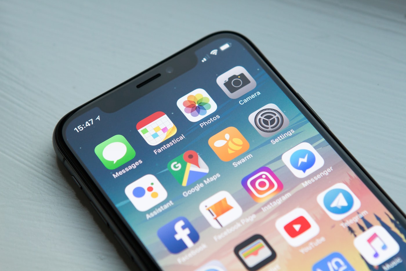 Someone checking a website on a phone — most UAE first impressions happen on mobile