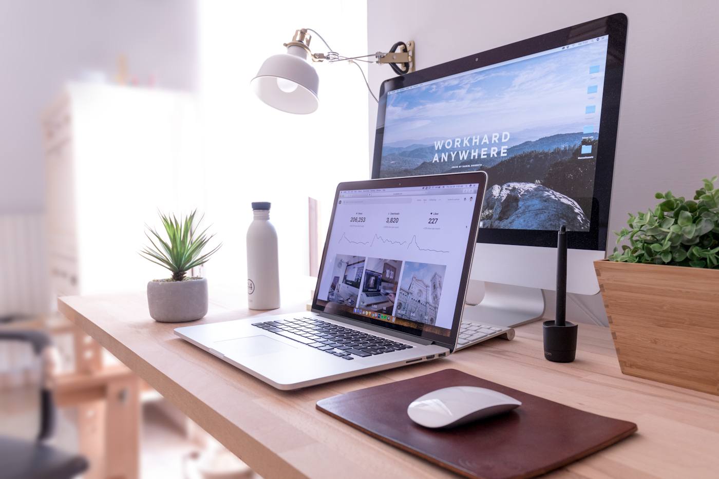 Laptop with a website editor open, comparing WordPress and custom builds